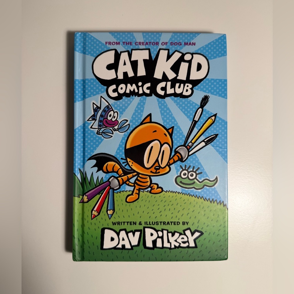 Cat Kid Comic Club by Dav Pilkey - Hardcover Book
- Colorful Graphic Novel